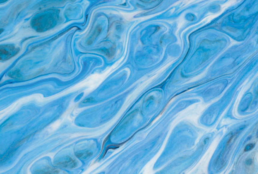 Blue swirl paint close up