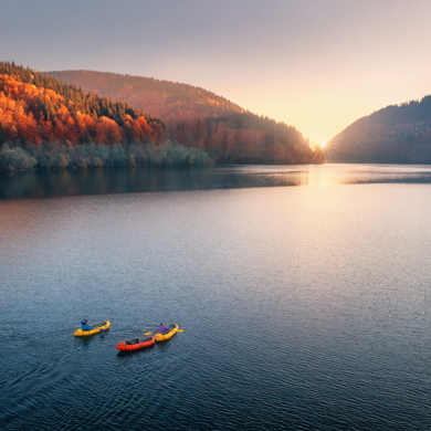 Rafts On A River At Sunrise