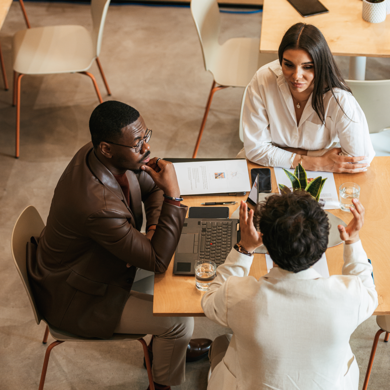 Colleagues talking in office