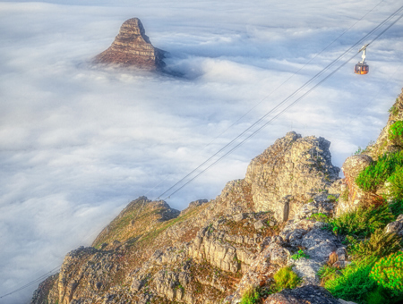 Mountain Cableway Surrounded By Clouds