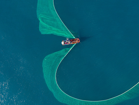 Boat sailing on water aerial shot